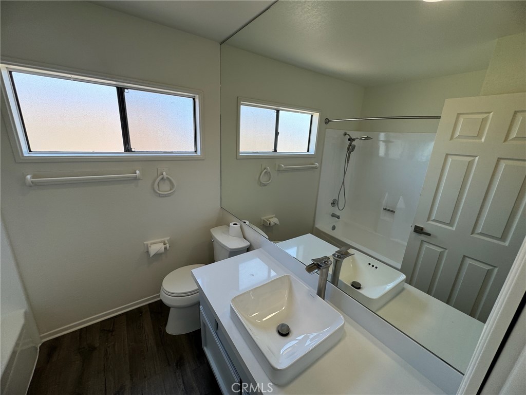 27515 Via Valor Dana Point, CA 92624 - Photo 13 of 24 a bathroom with a sink toilet and shower
