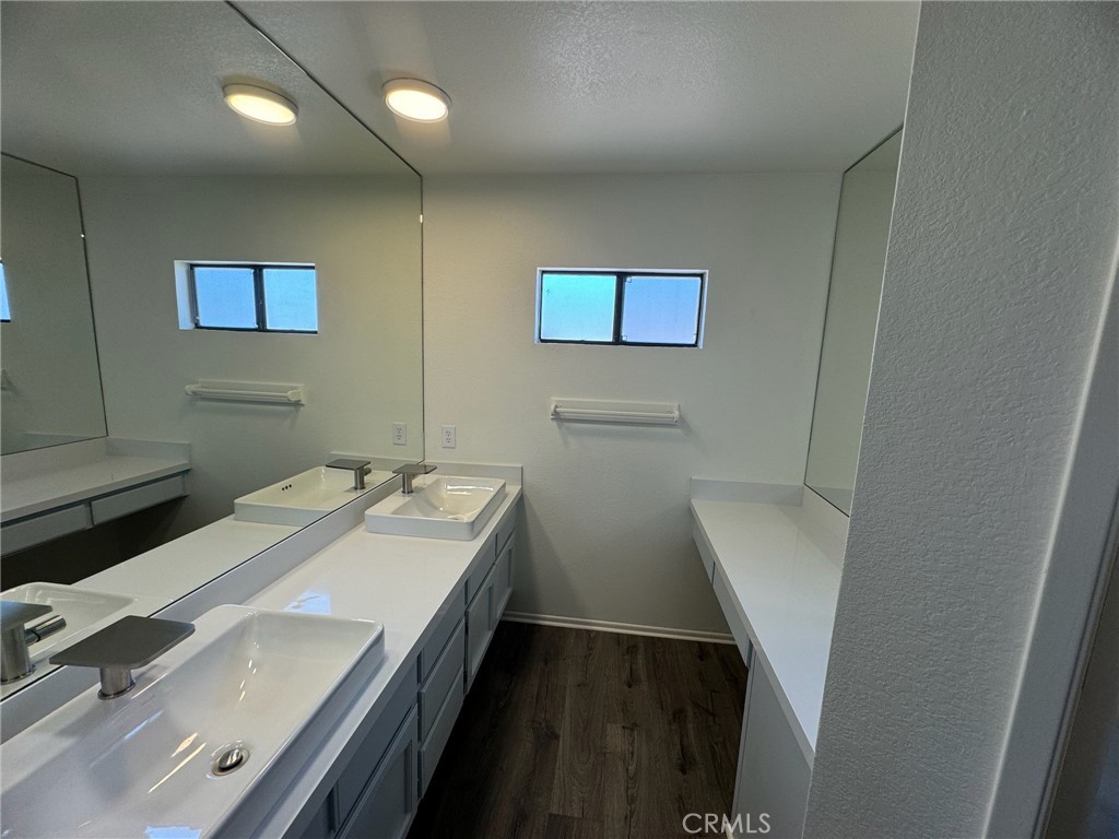 27515 Via Valor Dana Point, CA 92624 - Photo 17 of 24 a bathroom with a sink and a mirror