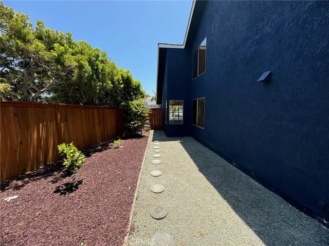 a view of backyard with a garden