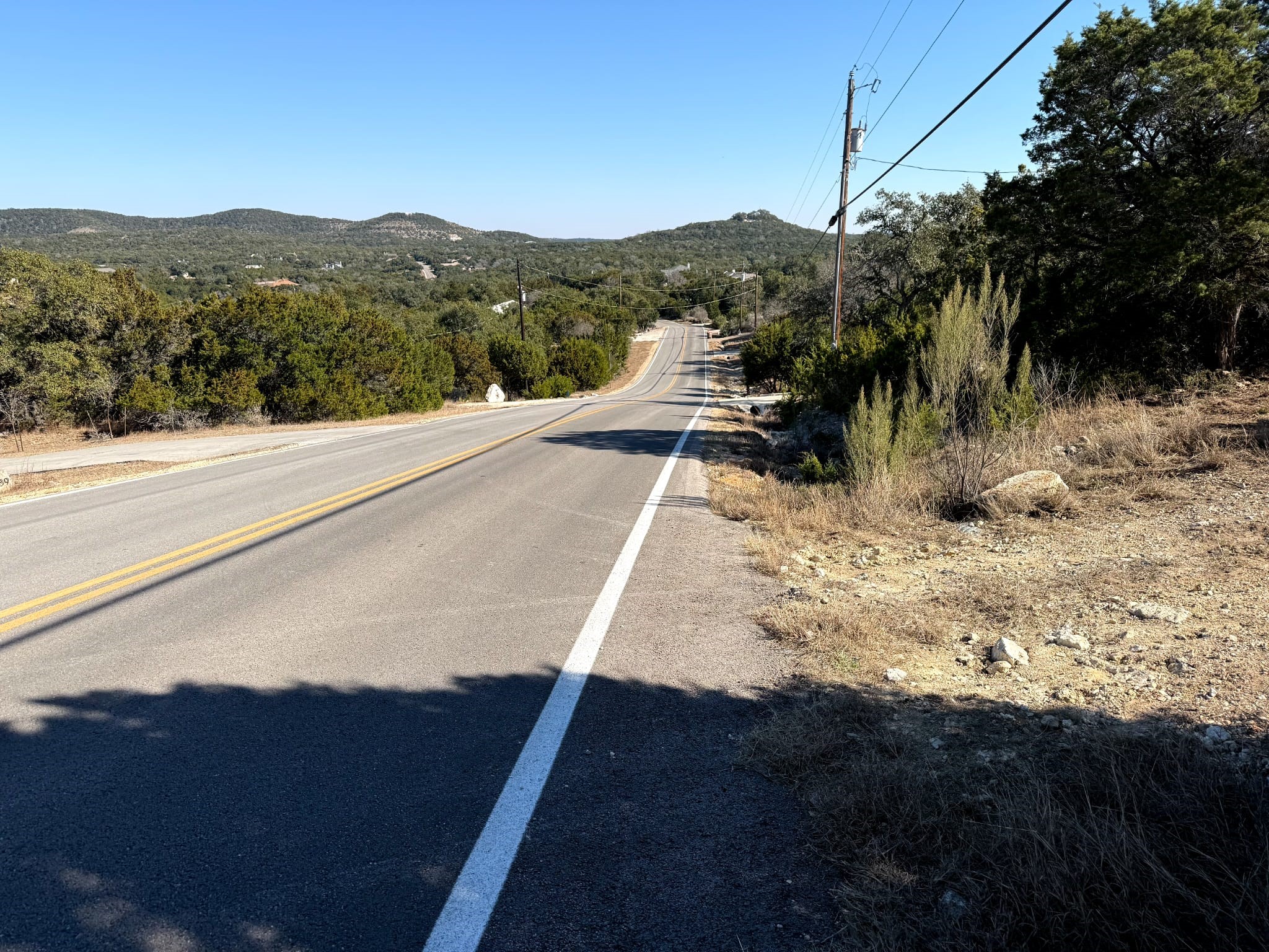 1392 Johnson Road Canyon Lake, TX 78133 - Photo 16 of 18 a view of a house with a yard