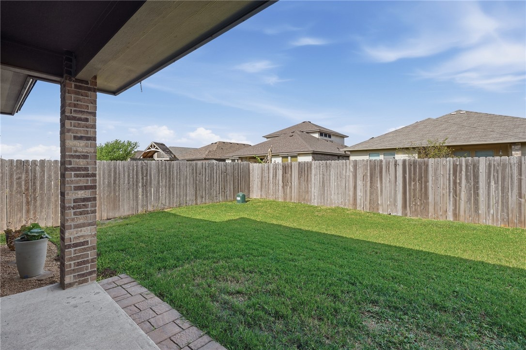 1026 Pasadena Street Portland, TX 78374 - Photo 26 of 30 a view of a backyard with a garden