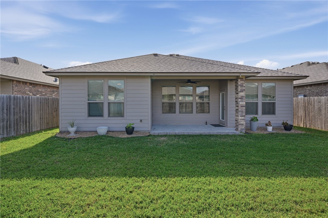 1026 Pasadena Street Portland, TX 78374 - Photo 28 of 30 a front view of a house with a garden