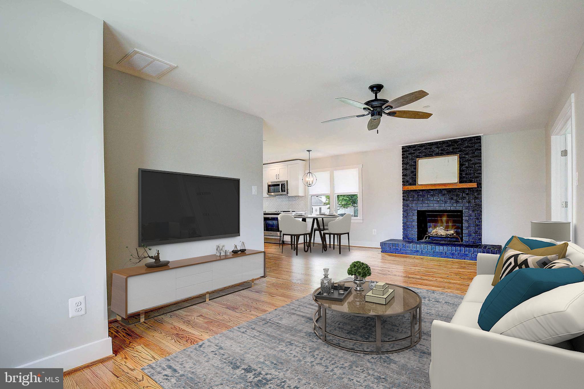 841 Spa Road Annapolis, MD 21401 - Photo 12 of 36 Cozy family room area with origianl fire place