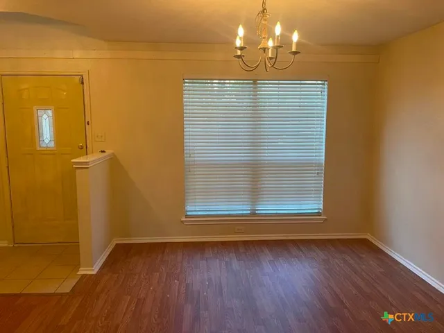 a view of a livingroom with a wooden floor