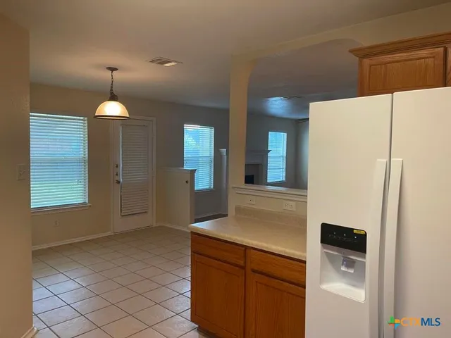 a bathroom with a sink a vanity and mirror