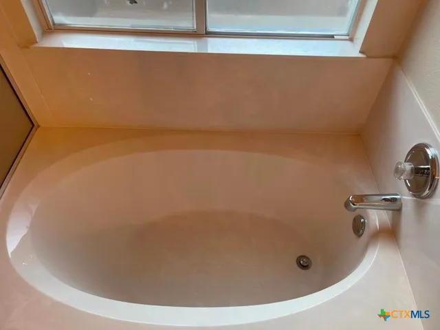 a bathroom with a tub