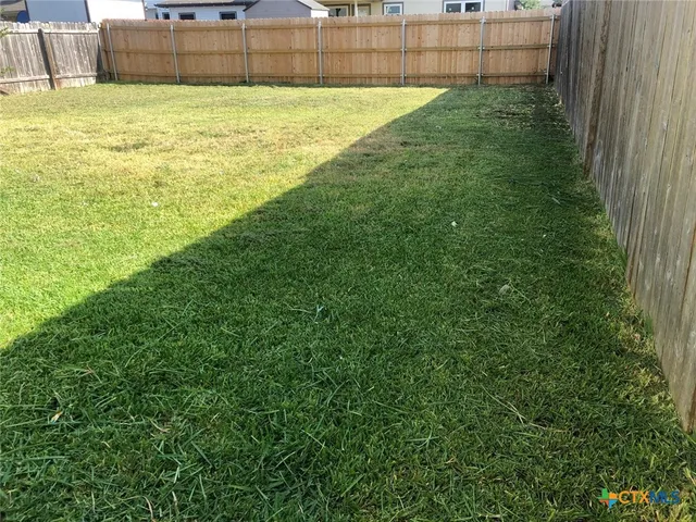 a view of an outdoor space and swimming pool