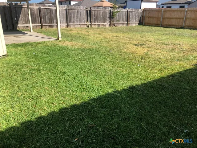 a house view with a garden