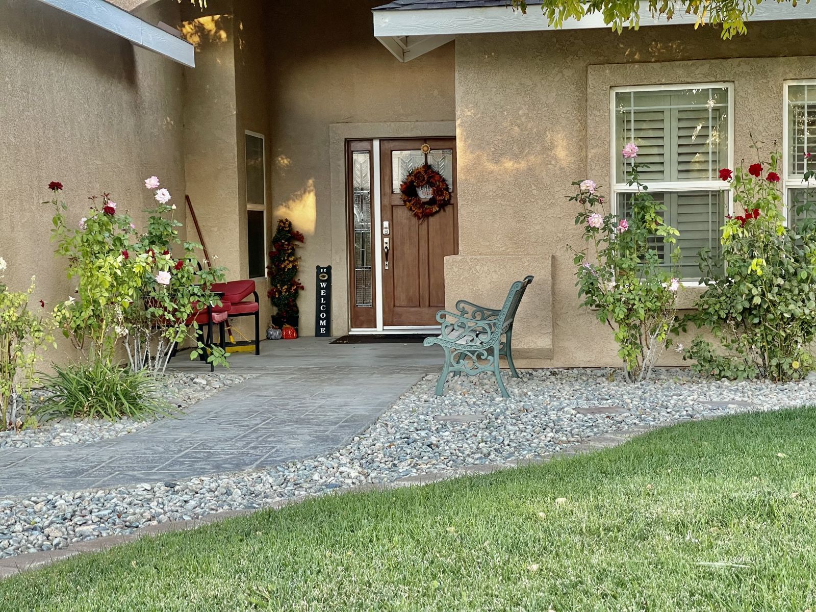 412 Acacia Street Ridgecrest, CA 93555 - Photo 2 of 31 a view of a backyard with potted plants