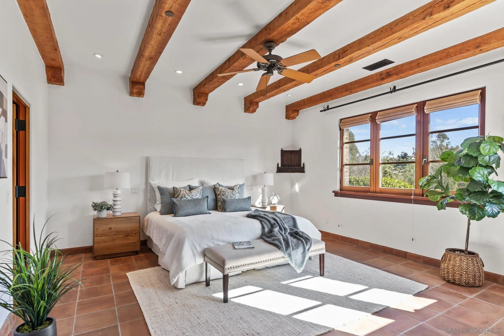 3113 Camino Del Rancho Encinitas, CA 92024 - Photo 12 of 40 a bedroom with furniture and a potted plant