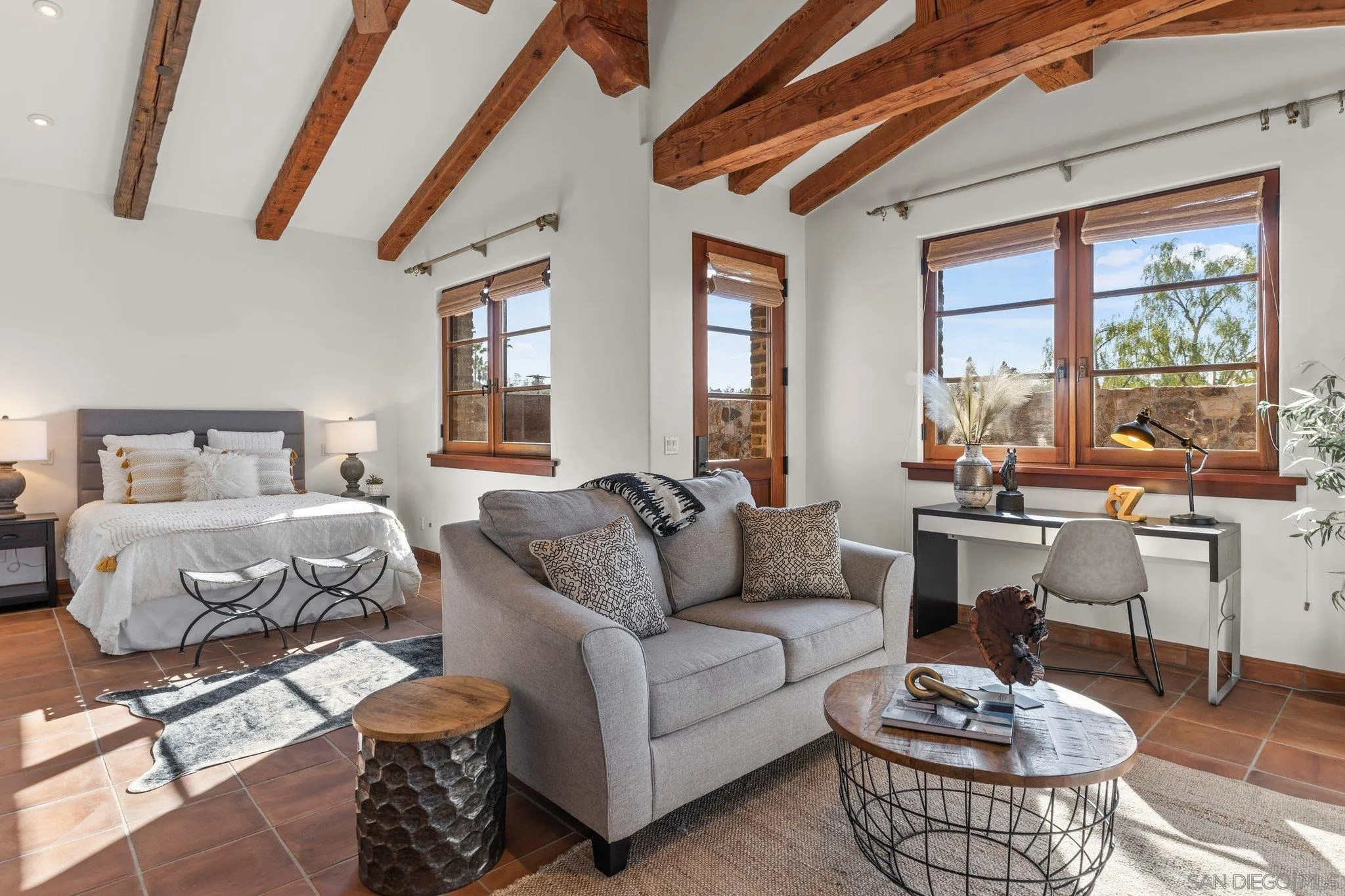 3113 Camino Del Rancho Encinitas, CA 92024 - Photo 16 of 40 a living room with furniture and a large window