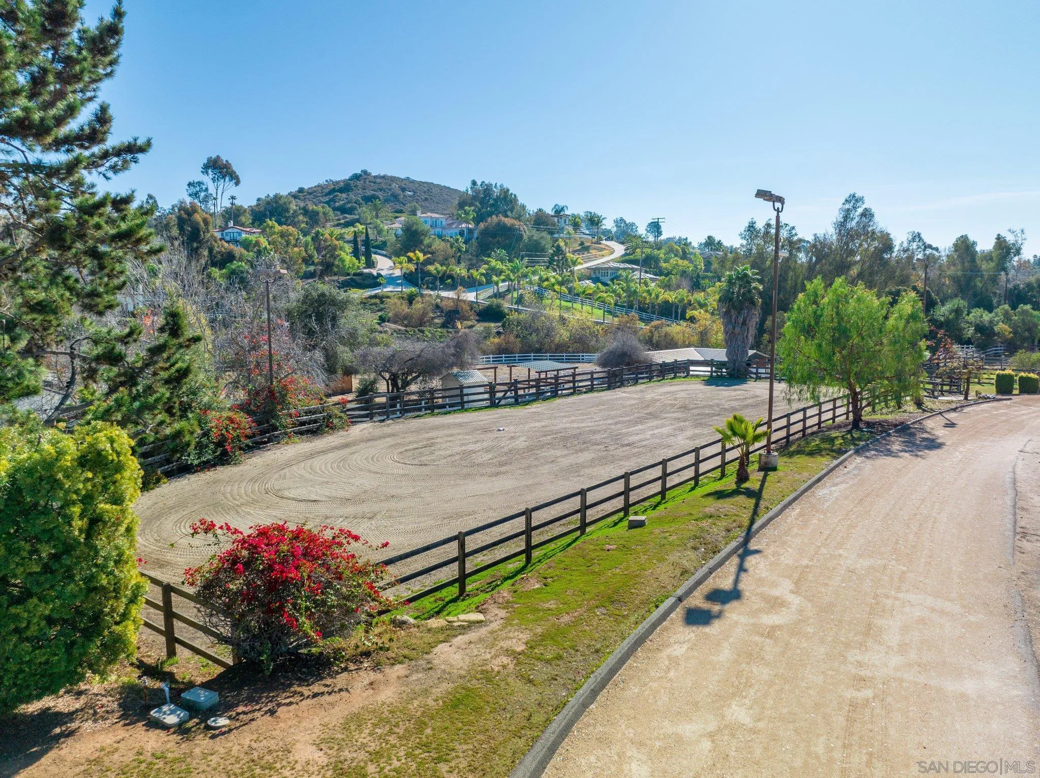 3113 Camino Del Rancho Encinitas, CA 92024 - Photo 38 of 40 a view of a terrace with a table and chairs
