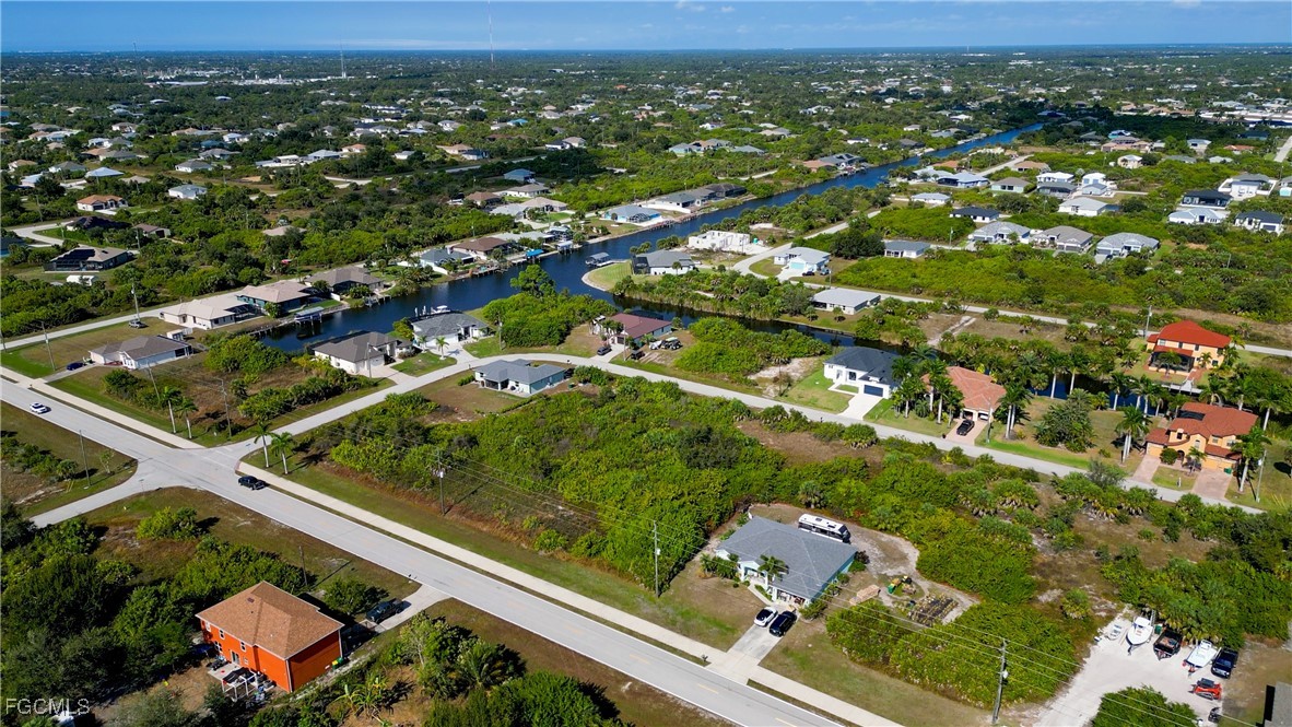 14110 Appleton Boulevard Port Charlotte, FL 33981 - Photo 16 of 19 an aerial view of residential houses with outdoor space