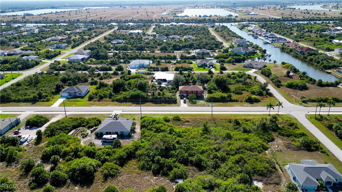 14110 Appleton Boulevard Port Charlotte, FL 33981 - Photo 17 of 19 an aerial view of a residential houses with outdoor space and swimming pool