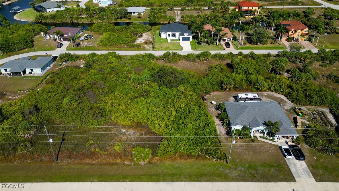 14110 Appleton Boulevard Port Charlotte, FL 33981 - Photo 5 of 19 an aerial view of residential houses with outdoor space and parking