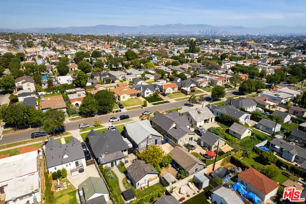 an aerial view of a city with lots of residential buildings