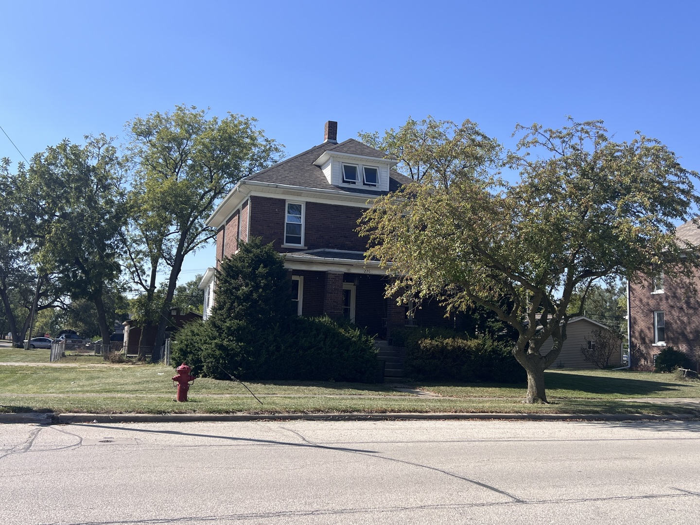226 South Main Street Rankin, IL 60960 - Photo 1 of 29 a front view of a house with a yard