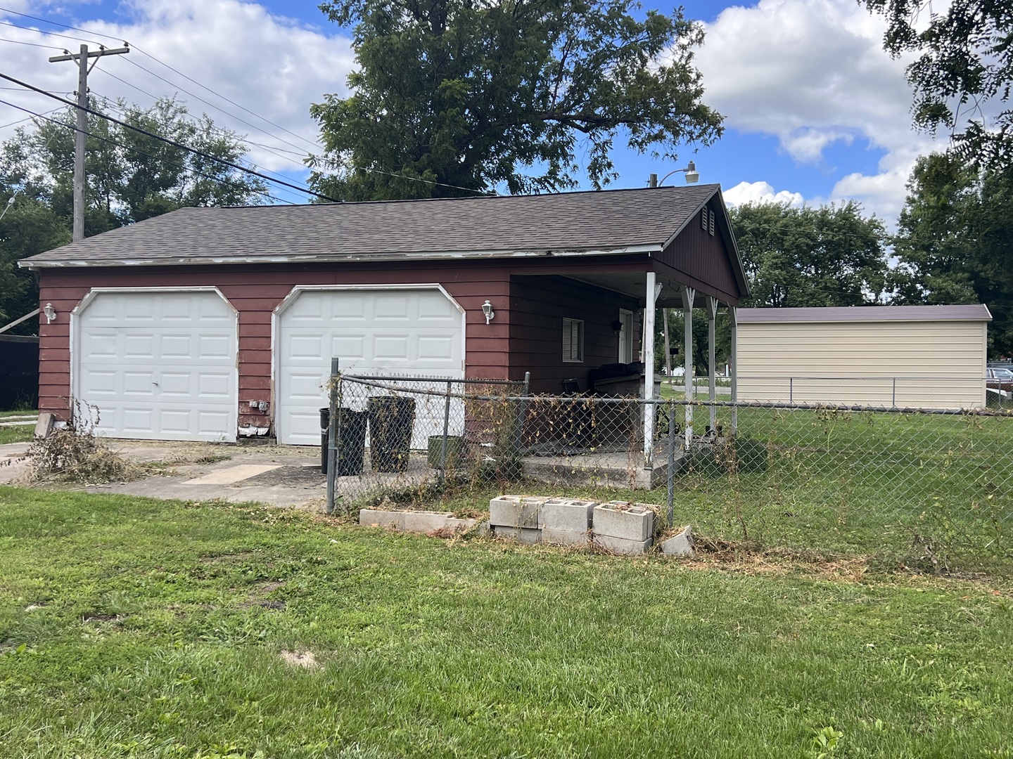 226 South Main Street Rankin, IL 60960 - Photo 6 of 29 a front view of house with yard and outdoor seating