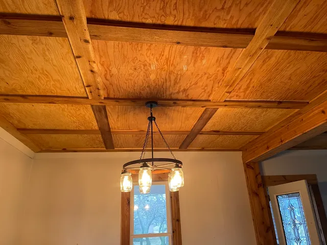 a view of a glass door with a glass windows and painted walls