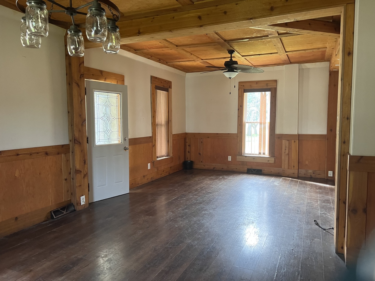 226 South Main Street Rankin, IL 60960 - Photo 10 of 29 an empty room with wooden floor and windows