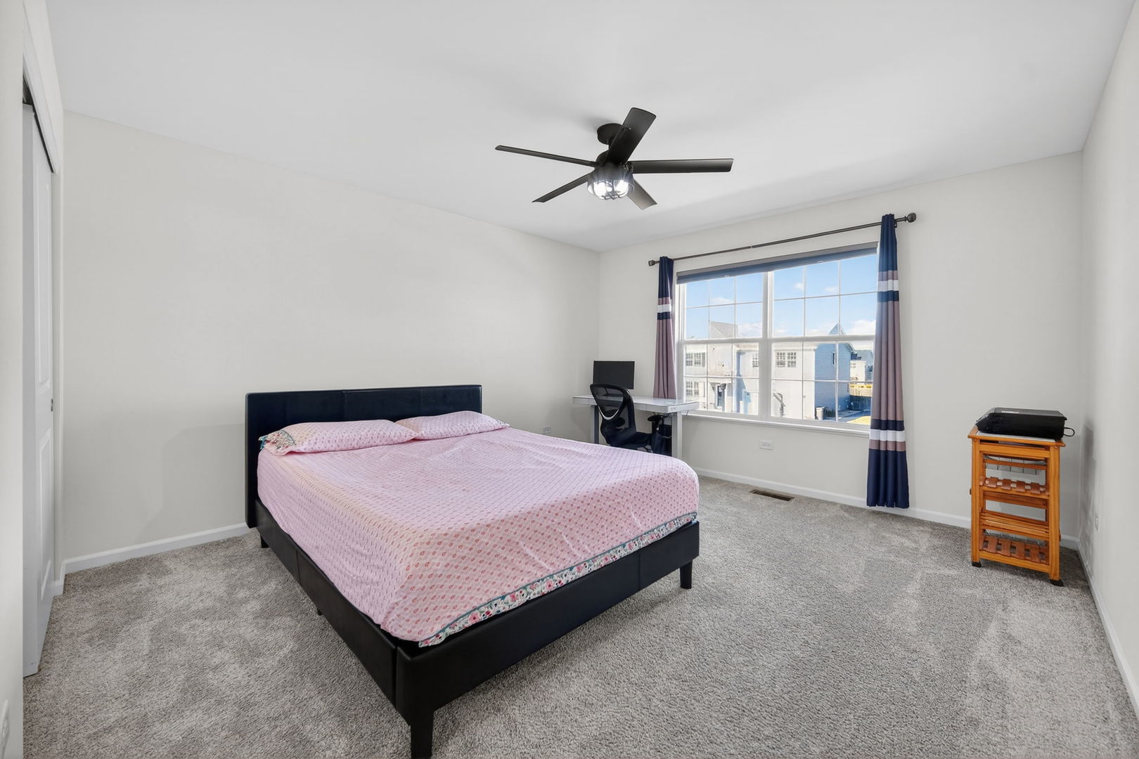 3803 Ivy Lane Elgin, IL 60124 - Photo 21 of 43 a bedroom with a bed and a window