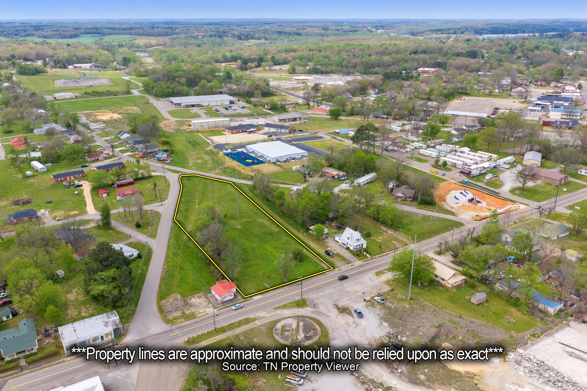 286 South Main Street Lexington, TN 38351 - Photo 6 of 13 an aerial view of residential houses with outdoor space