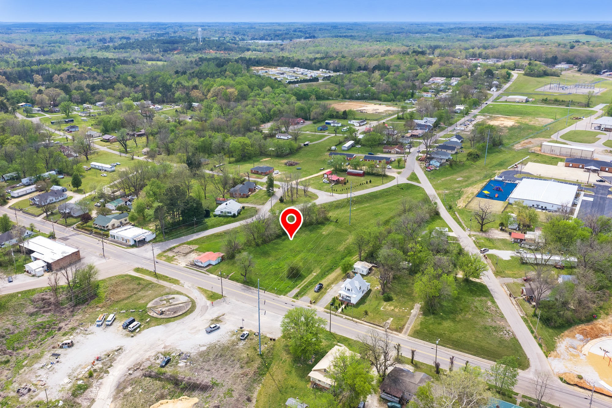 286 South Main Street Lexington, TN 38351 - Photo 7 of 13 an aerial view of residential houses with outdoor space