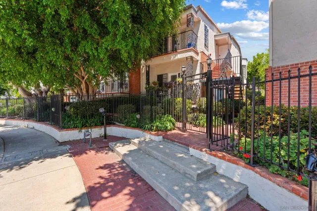a view of a street with a house