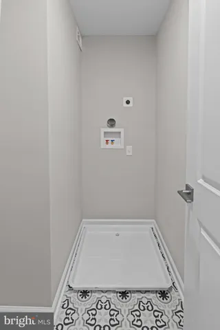 a bathroom with a bath tub