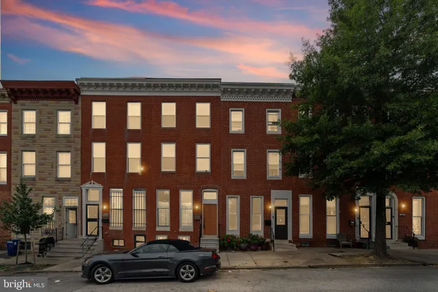 a car parked in front of a building