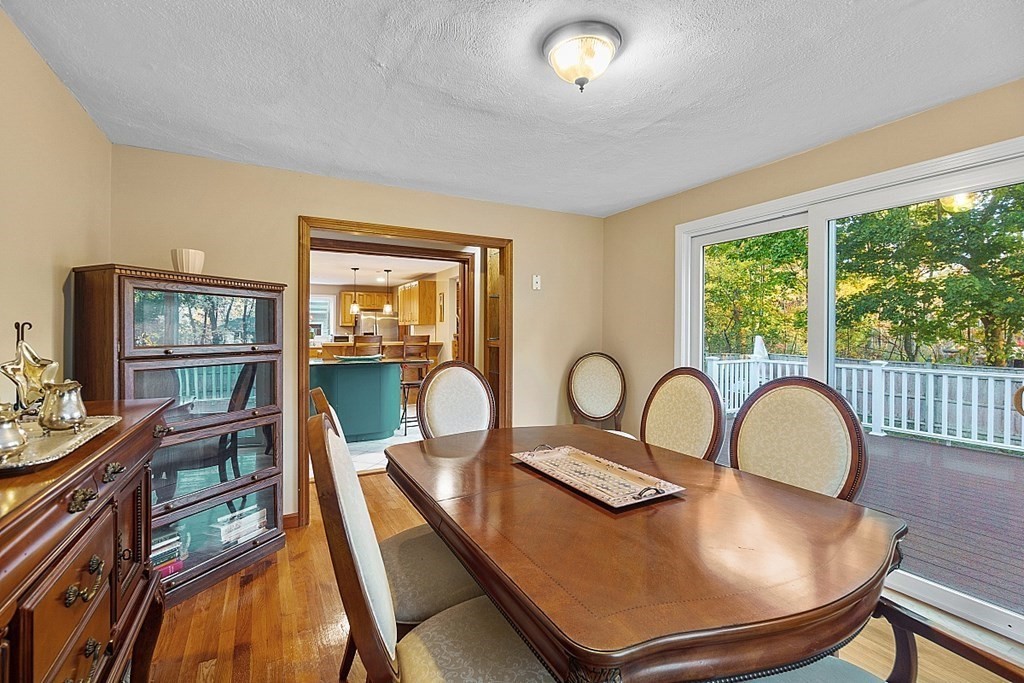 376 Littleton Road Chelmsford, MA 01824 - Photo 7 of 35 a view of a dining room with furniture window and wooden floor