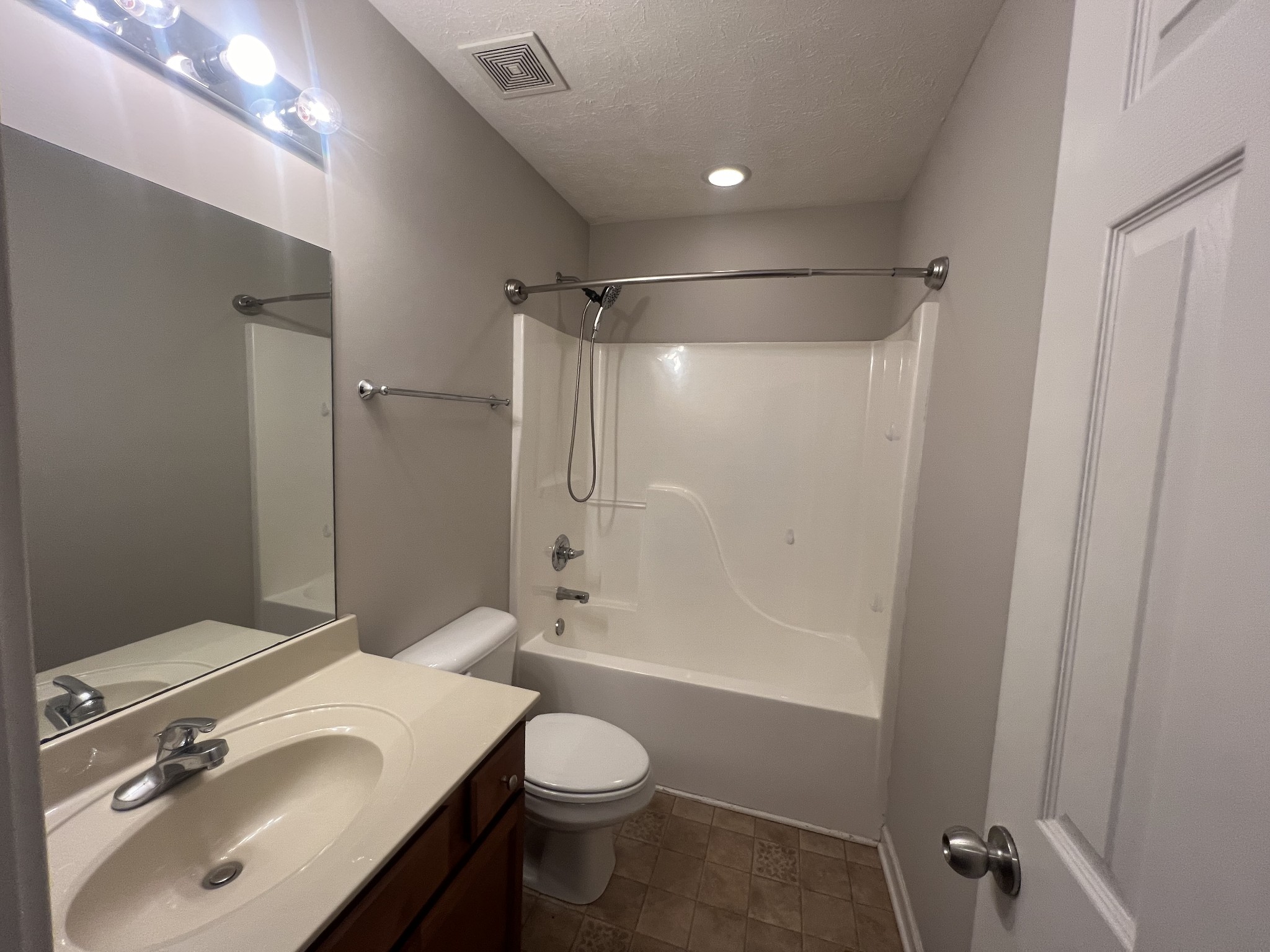 192 Wilkinson Road Cottontown, TN 37048 - Photo 12 of 20 a bathroom with a sink a toilet and shower