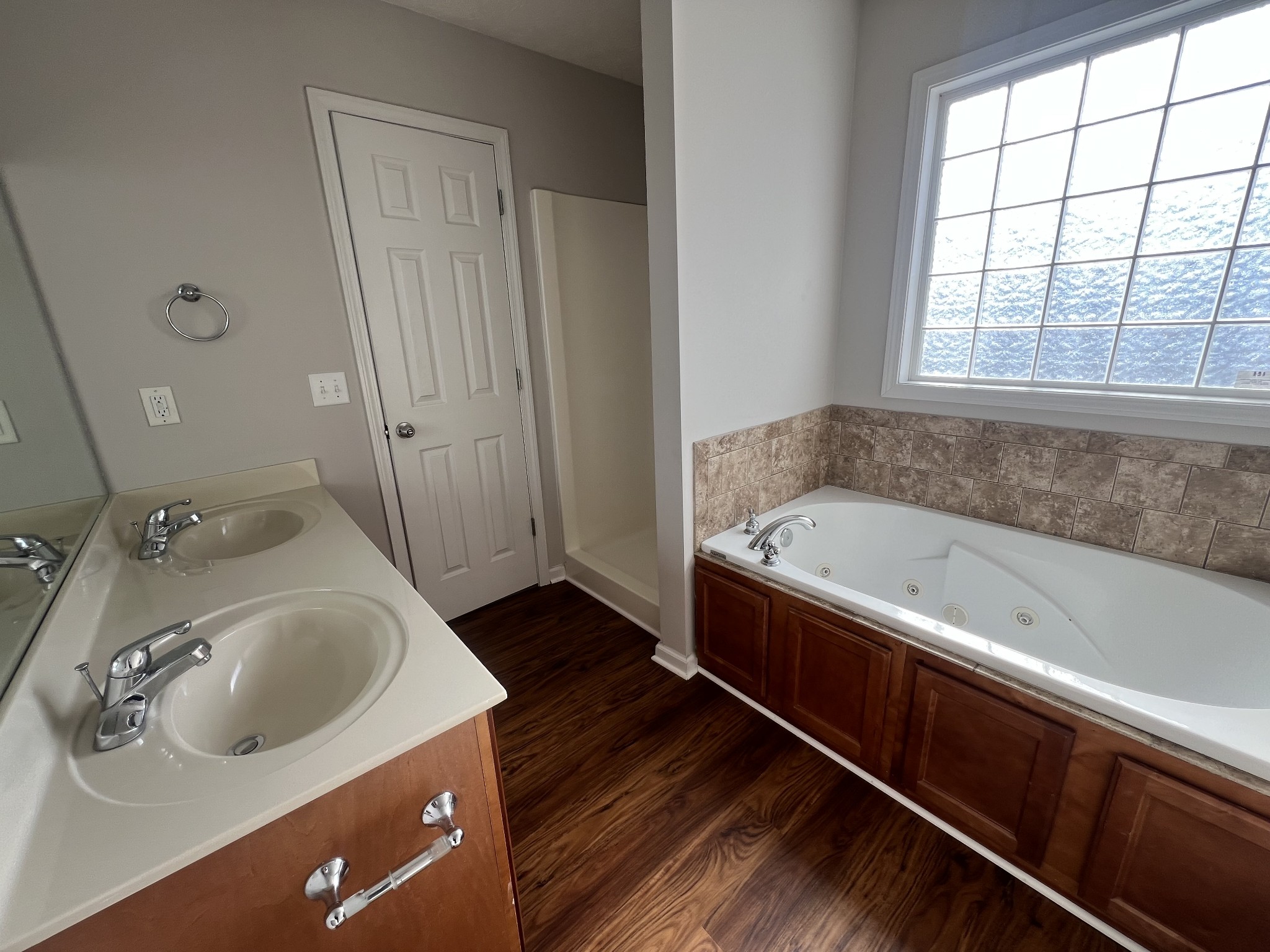 192 Wilkinson Road Cottontown, TN 37048 - Photo 10 of 20 a bathroom with a tub sink and mirror