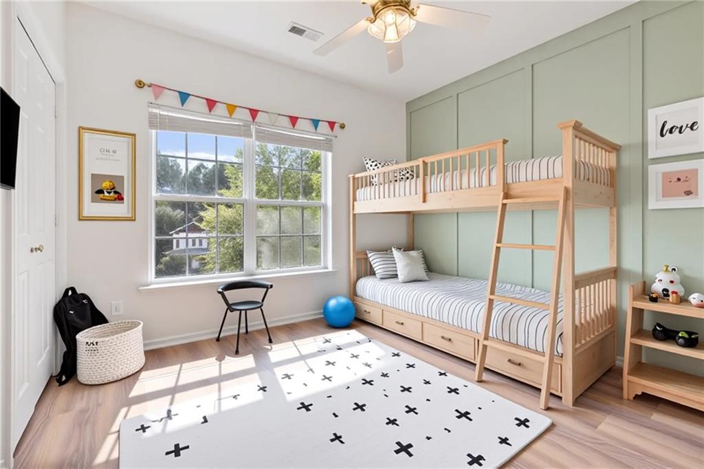 14 Bryan Springs Road Southwest Rome, GA 30165 - Photo 14 of 40 a bedroom with a bed and wooden floor