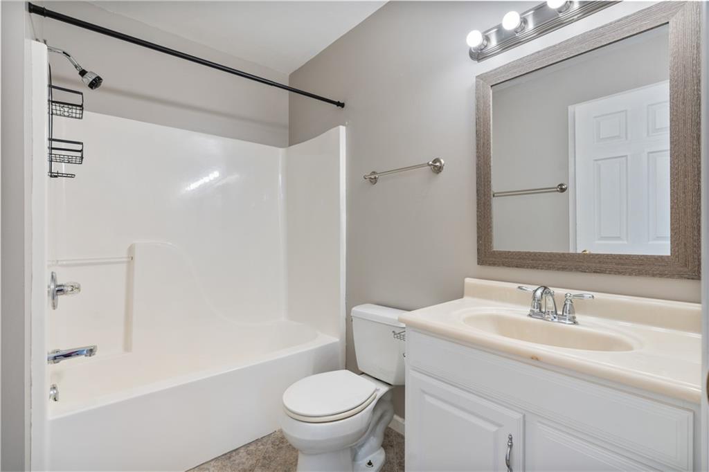 14 Bryan Springs Road Southwest Rome, GA 30165 - Photo 25 of 40 a bathroom with a sink toilet and shower