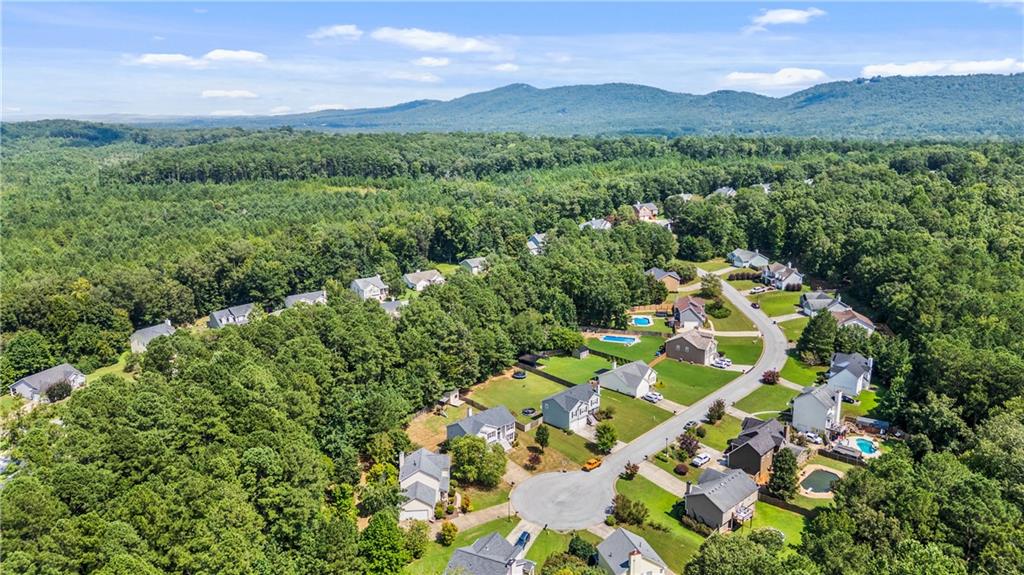 14 Bryan Springs Road Southwest Rome, GA 30165 - Photo 32 of 40 a view of a lush green hillside and houses