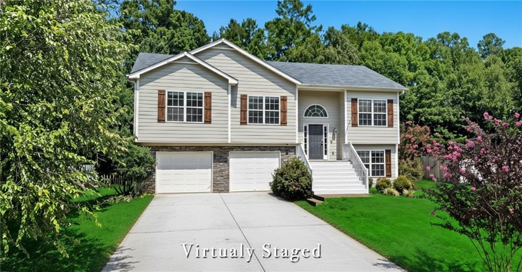14 Bryan Springs Road Southwest Rome, GA 30165 - Photo 38 of 40 a front view of a house with a yard and trees