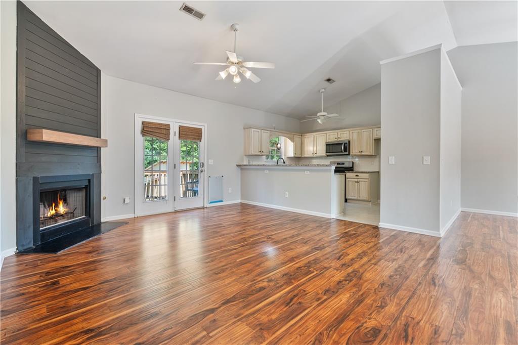 14 Bryan Springs Road Southwest Rome, GA 30165 - Photo 4 of 40 a view of a kitchen with microwave and refrigerator