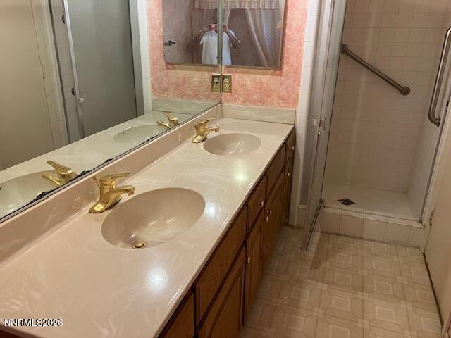 840 Meadow Springs Drive Reno, NV 89509 - Photo 14 of 23 a bathroom with a sink and a mirror