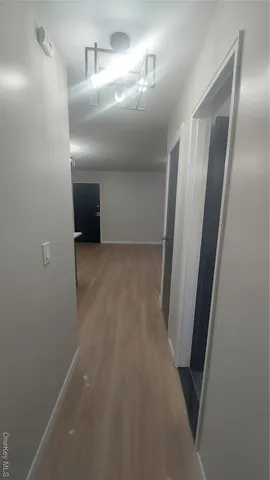 an empty room with a bathroom