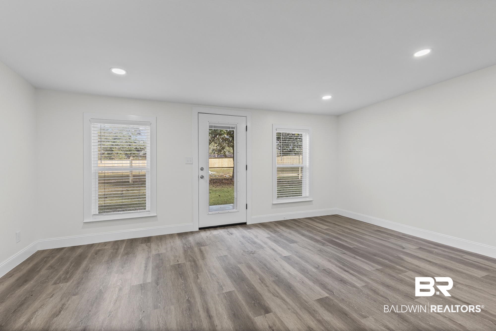 3041 Pretty Branch Drive East Mobile, AL 36618 - Photo 5 of 20 Unfurnished room with wood finished floors and recessed lighting