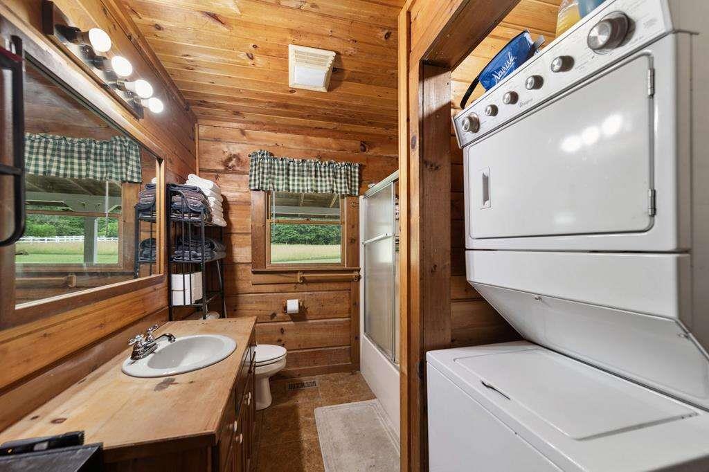 332 Night Lane Epworth, GA 30541 - Photo 35 of 84 a bathroom with a sink and a mirror