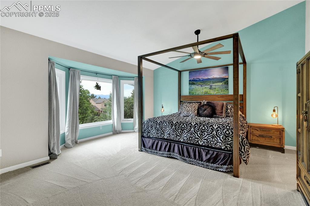 35 Lowick Drive Colorado Springs, CO 80906 - Photo 21 of 32 a bed sitting in a bedroom next to a window