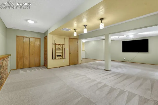 a view of a big room with a chandelier