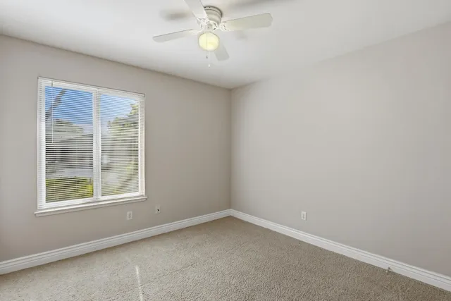 a view of swimming pool with a yard