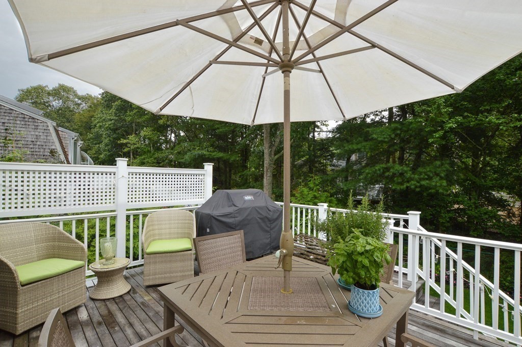89 Emerson Way Barnstable, MA 02632 - Photo 12 of 26 a view of balcony with furniture and umbrella