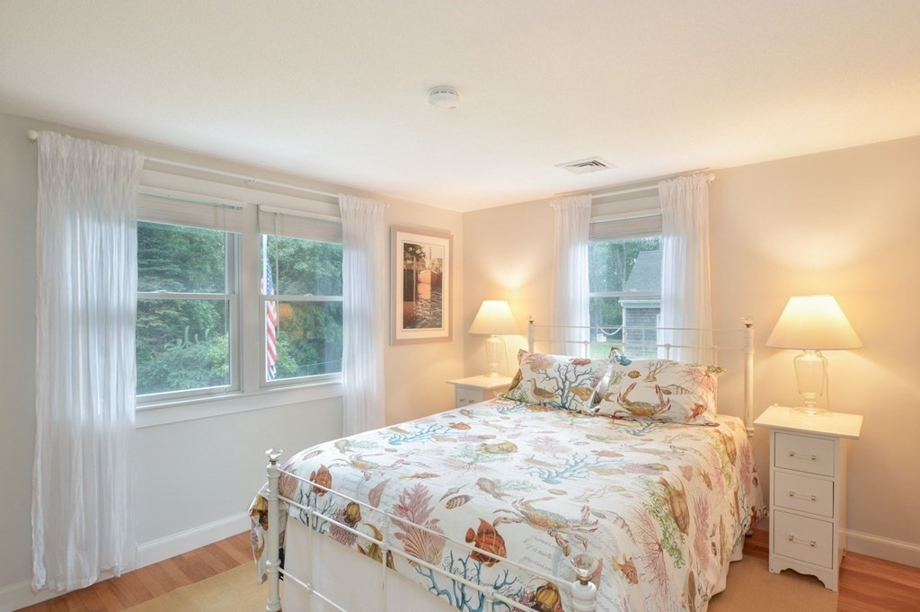 89 Emerson Way Barnstable, MA 02632 - Photo 13 of 26 a bedroom with a bed and a window