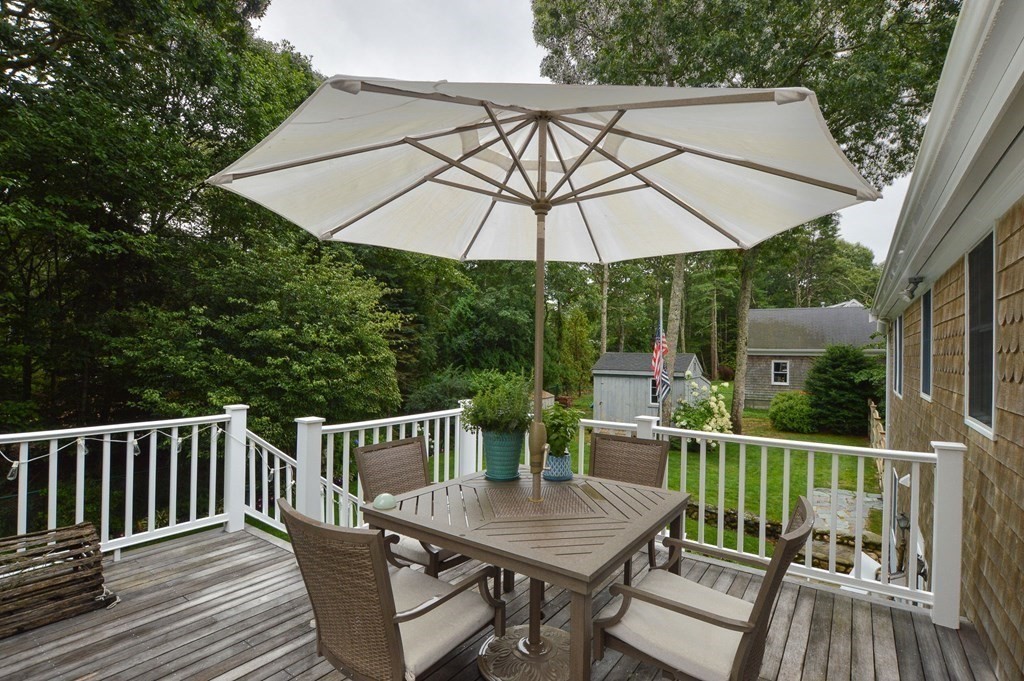 89 Emerson Way Barnstable, MA 02632 - Photo 21 of 26 a view of balcony with wooden floor and outdoor seating