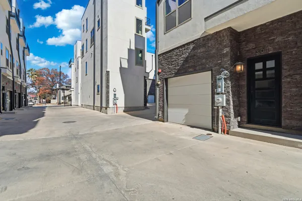 a view of a building with a street