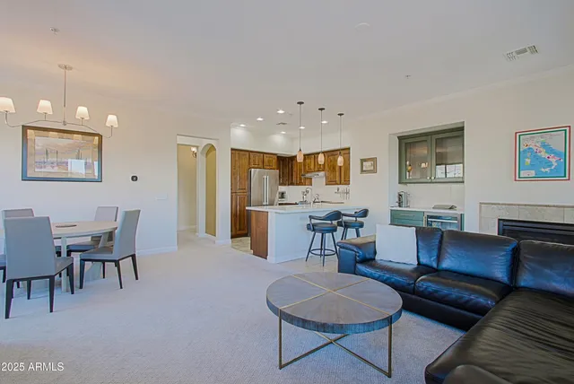 a view of a balcony with furniture